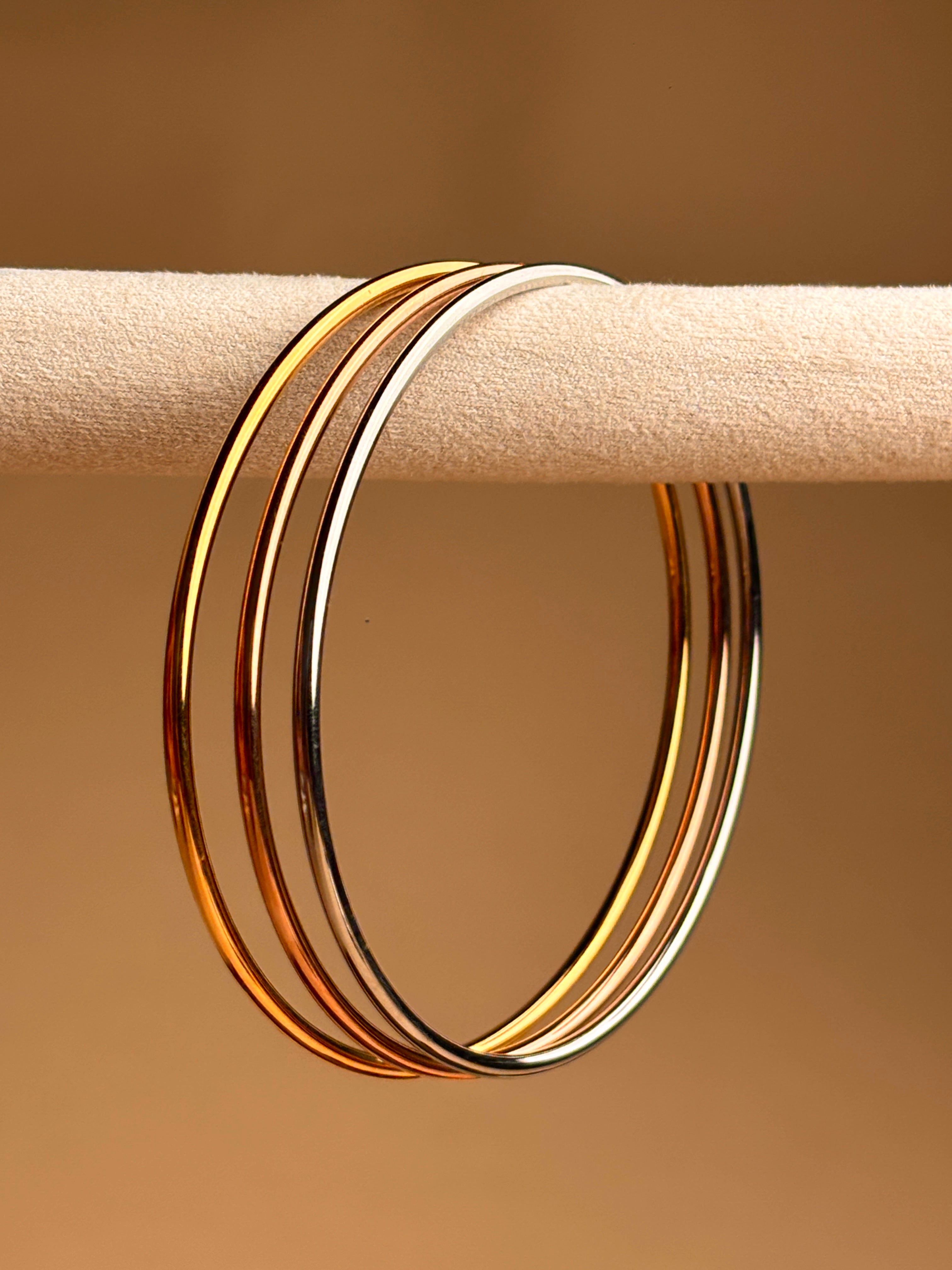 Three-tone Bangle Set (A beautiful mix of yellow gold, white gold, and rose gold, intertwined seamlessly)